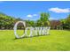Conway sign at lawn with surrounding mature trees at 1107 Woodside Dr., Conway, SC 29526