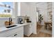 Chic butler's pantry with white cabinets, stylish fixtures, and ample storage at 1114 Laconic Dr., Myrtle Beach, SC 29588