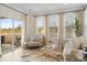 Comfortable living room with large windows, plush seating, and stylish accents at 1114 Laconic Dr., Myrtle Beach, SC 29588