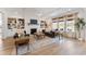 Spacious living room with built-in bookshelves, a fireplace, and ample natural light at 1114 Laconic Dr., Myrtle Beach, SC 29588