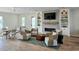 Bright community room features comfortable seating, fireplace, TV, and shelving at 1114 Laconic Dr., Myrtle Beach, SC 29588