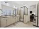 Bathroom features a double vanity with granite countertop and a glass-enclosed shower at 1188 Peterson St., Myrtle Beach, SC 29577