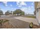 Landscaped front yard featuring a paver driveway and manicured lawn at 1188 Peterson St., Myrtle Beach, SC 29577