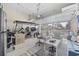 Garage converted to living space with seating and a golf cart at 1188 Peterson St., Myrtle Beach, SC 29577