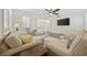 Bright living room with hardwood floors and neutral-toned furnishings. Flat screen TV on the wall at 1188 Peterson St., Myrtle Beach, SC 29577