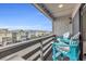 Relaxing balcony area with chairs and a view of the neighborhood at 120 Dogwood Dr. N # 313, Garden City Beach, SC 29576