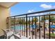 Balcony overlooking a pool, beach bar, and sandy beach with ocean views at 1200 North Ocean Blvd. # 206, Myrtle Beach, SC 29577