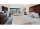 Comfortable bedroom with two beds, balcony access, dresser, and neutral decor at 1200 North Ocean Blvd. # 206, Myrtle Beach, SC 29577