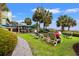 Outdoor lounge seating and a bar area with a view of the ocean at 1200 North Ocean Blvd. # 206, Myrtle Beach, SC 29577