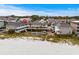 Coastal condo complex with a shared pool offers a beachside retreat at 1217 S Ocean Blvd. # 5, Surfside Beach, SC 29575