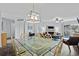 Open concept featuring the dining area that flows into the inviting living room at 1217 S Ocean Blvd. # 5, Surfside Beach, SC 29575