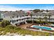 Beachfront condos with a pool offer a blend of relaxation and recreation at 1217 S Ocean Blvd. # 5, Surfside Beach, SC 29575