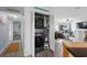 Convenient laundry closet featuring a stacked washer and dryer, and easy access to living area at 1217 S Ocean Blvd. # 5, Surfside Beach, SC 29575