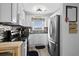 Well-equipped kitchen boasting stainless steel appliances and sleek black countertops at 1217 S Ocean Blvd. # 5, Surfside Beach, SC 29575