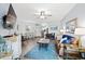 Spacious living room and dining area with comfortable seating, perfect for relaxation at 1217 S Ocean Blvd. # 5, Surfside Beach, SC 29575