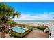 Stunning aerial view of the pool and beach, showcasing the proximity to the ocean at 1217 S Ocean Blvd. # 5, Surfside Beach, SC 29575