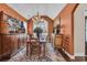 Elegant dining room featuring a chandelier, a wooden table, and a built-in china cabinet at 124 Turtle Creek Dr., Pawleys Island, SC 29585