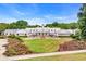 Expansive estate boasting symmetrical design, manicured lawns, and a grand entrance, perfect for luxurious living at 124 Turtle Creek Dr., Pawleys Island, SC 29585