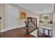 Hallway with hardwood staircase, detailed railing, and entry foyer view at 124 Turtle Creek Dr., Pawleys Island, SC 29585