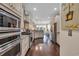 Bright kitchen with stainless appliances, granite countertops and hardwood flooring throughout at 124 Turtle Creek Dr., Pawleys Island, SC 29585