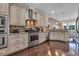 Well-equipped kitchen with stainless steel appliances and a mosaic backsplash at 124 Turtle Creek Dr., Pawleys Island, SC 29585