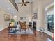 Bright living room features fireplace, hardwood floors, and soaring ceilings at 124 Turtle Creek Dr., Pawleys Island, SC 29585