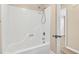 Clean bathroom features a new shower with bright white tub and tile surround at 131 Pine Lake Circle, Ocean Isle Beach, NC 28469