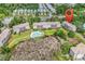 Aerial view of property with community pool, convenient parking and beautiful surroundings at 140 South Cove Pl. # 6C, Pawleys Island, SC 29585