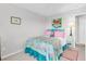 Inviting bedroom featuring vibrant linens, a comfortable bed, and coordinated décor at 140 South Cove Pl. # 6C, Pawleys Island, SC 29585