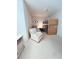 Charming bedroom featuring a twin bed, bunk beds, porthole mirror, and a cozy armchair at 140 South Cove Pl. # 6C, Pawleys Island, SC 29585