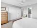 Neutral bedroom featuring a large closet, adjacent bathroom, and a comfortable area to unwind at 140 South Cove Pl. # 6C, Pawleys Island, SC 29585