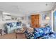 Inviting living room with plush seating, warm decor, and an open floor plan at 140 South Cove Pl. # 6C, Pawleys Island, SC 29585
