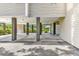 Ground-level parking beneath an elevated coastal home reveals concrete pillars and space for parking or outdoor storage at 140 South Cove Pl. # 6C, Pawleys Island, SC 29585