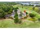 Aerial view of the condo community and golf course, surrounded by lush greenery and close to the waterway at 1401 Lighthouse Dr. # 4334, Little River, SC 29566