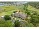 Beautiful aerial view of a low-rise condo building surrounded by lush golf course and the Intracoastal waterway at 1401 Lighthouse Dr. # 4334, Little River, SC 29566