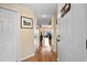 Inviting hallway featuring hardwood floors leading to a spacious living area at 1401 Lighthouse Dr. # 4334, Little River, SC 29566