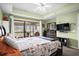Inviting main bedroom with sliding door access to screened porch, enhancing natural light and views at 1401 Lighthouse Dr. # 4334, Little River, SC 29566
