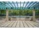 View of tennis courts with lush landscaping; an ideal spot for recreational activities in a serene setting at 1401 Lighthouse Dr. # 4334, Little River, SC 29566