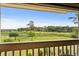 Picturesque view of the golf course from the balcony, showcasing the community's beautiful green landscape at 1401 Lighthouse Dr. # 4334, Little River, SC 29566