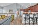 Hallway sitting area looking into the kitchen with granite countertops and stainless steel appliances at 1413 Cottage Cove Circle, North Myrtle Beach, SC 29582