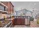 Open concept living featuring a gourmet kitchen with granite countertops and stainless steel appliances at 1413 Cottage Cove Circle, North Myrtle Beach, SC 29582