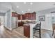 Modern kitchen with stainless steel appliances, granite countertops, and bar seating at 1413 Cottage Cove Circle, North Myrtle Beach, SC 29582