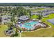 Aerial shot of a large community pool, playground, and outdoor recreational areas at 1520 Jardine Loop, Little River, SC 29566