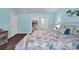 Bright main bedroom with ensuite bathroom, walk-in closet, and a charming coastal aesthetic at 1520 Jardine Loop, Little River, SC 29566