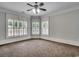 Cozy bedroom featuring three large windows at 1613 James Island Ave., North Myrtle Beach, SC 29582
