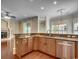 Modern kitchen with granite counters, stainless steel appliances and hardwood floors at 1613 James Island Ave., North Myrtle Beach, SC 29582