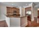 Open kitchen with granite countertops, stainless steel appliances, and a breakfast bar at 1613 James Island Ave., North Myrtle Beach, SC 29582