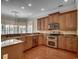 Kitchen with granite countertops, stainless steel appliances, and custom wood cabinets at 1613 James Island Ave., North Myrtle Beach, SC 29582