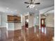 Open-concept living room with hardwood floors, granite countertops, and detailed trim work at 1613 James Island Ave., North Myrtle Beach, SC 29582