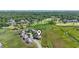 A bird's-eye view captures the home's prime location near lush greenery, waterways, and golf course at 1663 Harbor Dr., North Myrtle Beach, SC 29582